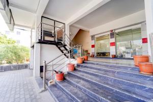 Fotografie z fotogalerie ubytování Super Hotel O Nagamalaipudukottai Madurai v destinaci Madurai