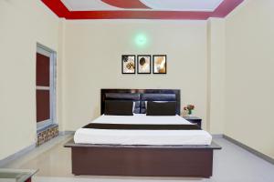 Postel nebo postele na pokoji v ubytování Hotel O NKA