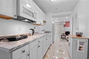 Kuchyň nebo kuchyňský kout v ubytování Laurel Cozy Hideaway