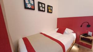 Cama ou camas em um quarto em Hotel International & Terminus