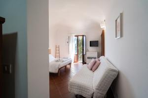Postel nebo postele na pokoji v ubytování Casa Scala