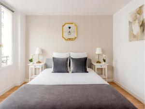 Posteľ alebo postele v izbe v ubytovaní Merveil - Family Suite - Marais - Martin V