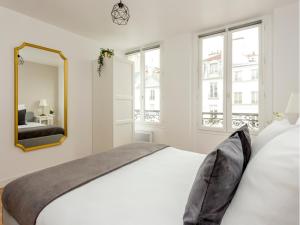 Posteľ alebo postele v izbe v ubytovaní Merveil - Family Suite - Marais - Martin V