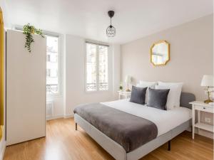 Posteľ alebo postele v izbe v ubytovaní Merveil - Family Suite - Marais - Martin V