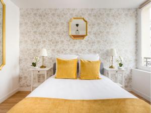 Posteľ alebo postele v izbe v ubytovaní Merveil - Family Suite - Marais - Martin V