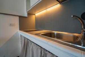 Kuchyň nebo kuchyňský kout v ubytování Casa Scala