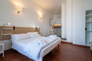Postel nebo postele na pokoji v ubytování Casa Scala