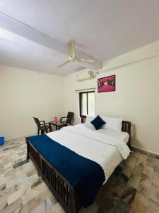 Ένα ή περισσότερα κρεβάτια σε δωμάτιο στο hotel data in