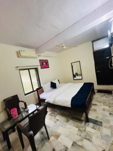 Ένα ή περισσότερα κρεβάτια σε δωμάτιο στο hotel data in