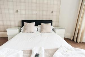 Postel nebo postele na pokoji v ubytování Nethway Hotel
