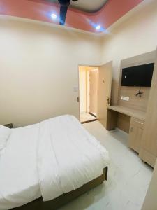 TV a/nebo společenská místnost v ubytování Modest Rooms By Libra