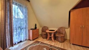 Posedenie v ubytovaní Pokoje Apartamenty Pod Limbą