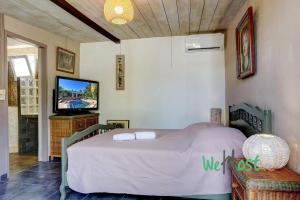 Ένα ή περισσότερα κρεβάτια σε δωμάτιο στο "Villa Alessandra" Sublime villa proche lagon +50 φωτογραφίες