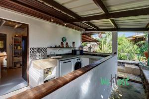 Η κουζίνα ή μικρή κουζίνα στο "Villa Alessandra" Sublime villa proche lagon