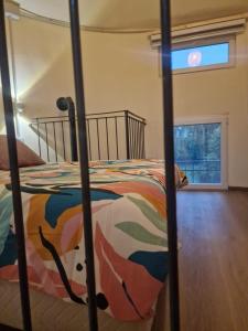 A bed or beds in a room at Hotel Fondo Catena