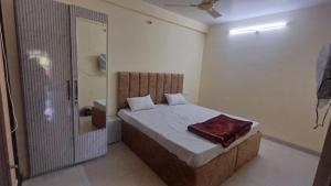 Ένα ή περισσότερα κρεβάτια σε δωμάτιο στο dreams villa +1 φωτογραφίες