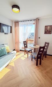 O zonă de relaxare la Apartamenty Benjamin