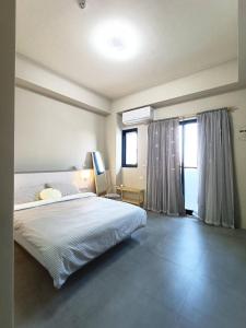 Vuode tai vuoteita majoituspaikassa tinytiny house