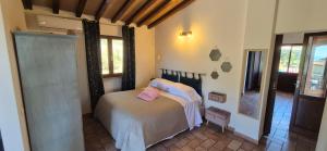 Posteľ alebo postele v izbe v ubytovaní Agriturismo Suite del Conte + 37 fotografií