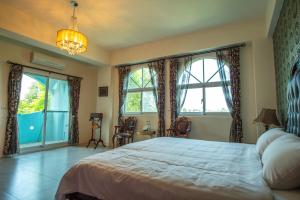 Lova arba lovos apgyvendinimo įstaigoje Ding Shian B&B