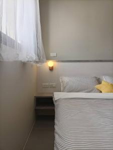 Vuode tai vuoteita majoituspaikassa tinytiny house