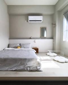 Vuode tai vuoteita majoituspaikassa tinytiny house