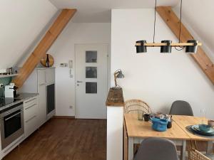 Kuchyň nebo kuchyňský kout v ubytování Terrassen Appartement über den Dächern von Krems + 36 fotografií