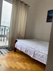 Postel nebo postele na pokoji v ubytování Apartment Rooms Niva