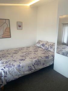 Postel nebo postele na pokoji v ubytování Apartment Rooms Niva