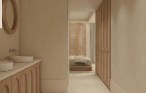 a bathroom with a sink and a mirror at Infinity Hotel & More in Budva