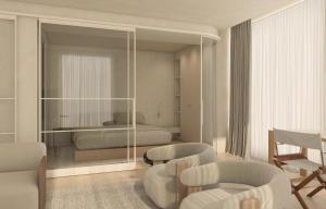 a bedroom with a bed and a living room at Infinity Hotel & More in Budva