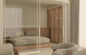 a bedroom with a bed and a glass wall at Infinity Hotel & More in Budva +37 photos
