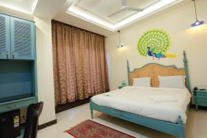 Ένα ή περισσότερα κρεβάτια σε δωμάτιο στο Shiv Ashray