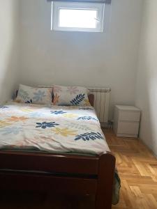 Postel nebo postele na pokoji v ubytování Apartment Rooms Niva