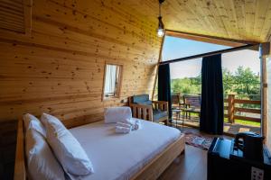 Postel nebo postele na pokoji v ubytování Mesopotam Agrotourism Resort