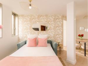 Posteľ alebo postele v izbe v ubytovaní Merveil - Family Suite - Tour Eiffel - Viala I