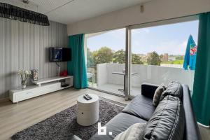 TV/trung tâm giải trí tại De Haan 2 kamer vlak aan zee