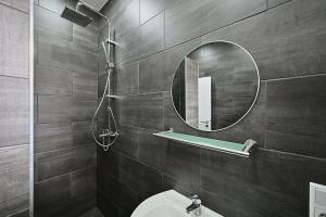 Koupelna v ubytování BetonTraum Apartment