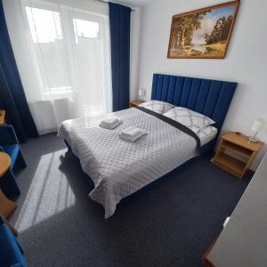 Postel nebo postele na pokoji v ubytování Akwen