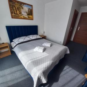 Postel nebo postele na pokoji v ubytování Akwen
