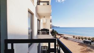 a balcony with a view of the beach at CASA AL MARE RESIDENCE in Bečići