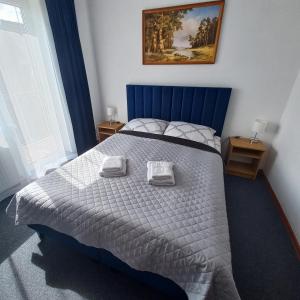 Postel nebo postele na pokoji v ubytování Akwen