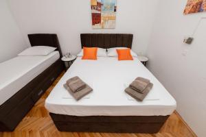 Postel nebo postele na pokoji v ubytování Apartment Sofija