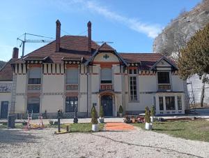 a large white house with a brown roof at EVASION LOUE #6 x2 people "La BRIQUERIE" in Lods