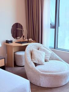 Postel nebo postele na pokoji v ubytování Muong Thanh Luxury Nha Trang Hotel