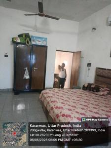 Postel nebo postele na pokoji v ubytování Rohit Homestay
