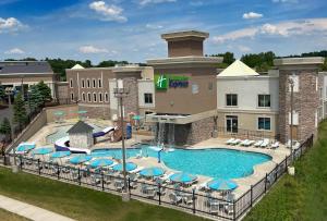 an aerial view of a hotel with a swimming pool at Holiday Inn Express Wisconsin Dells by IHG in Wisconsin Dells