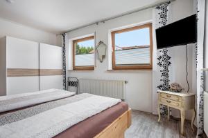 TV a/nebo společenská místnost v ubytování Ferienwohnung-4you