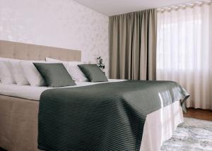 Ένα ή περισσότερα κρεβάτια σε δωμάτιο στο Best Western Plus Kalmarsund Hotell