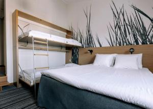 Ένα ή περισσότερα κρεβάτια σε δωμάτιο στο Best Western Plus Kalmarsund Hotell